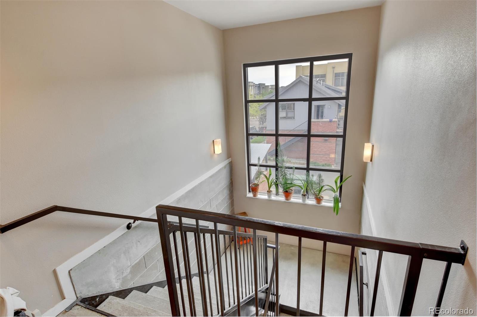4520 Broadway, Unit 210 Boulder, CO 80304 - Photo 4 of 36 a view of a hallway with windows