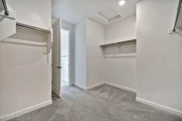 a view of a hallway with windows