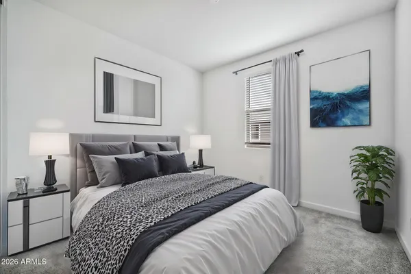 an empty room with closet and a bathroom