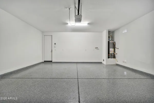 a view of a backyard with a garden and plants