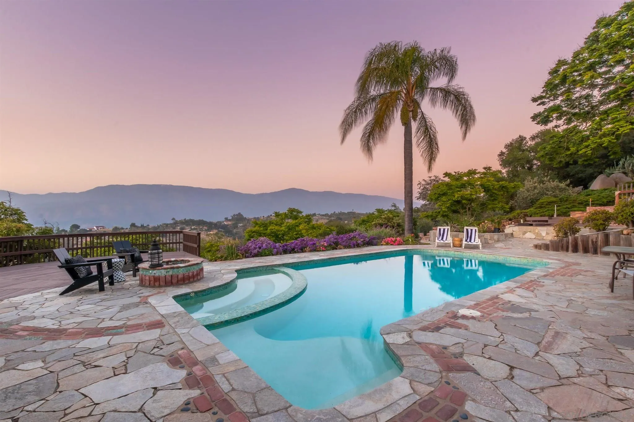 13786 McNally Road Valley Center, CA 92082 - Photo 1 of 1 a view of a swimming pool with a lounge chair