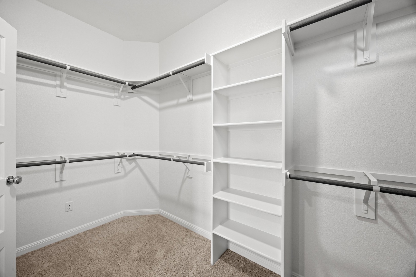 200 Hornet Street Elgin, TX 78621 - Photo 19 of 39 a view of an empty walk in closet