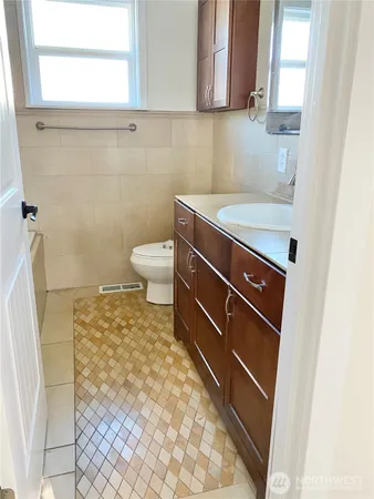 a bathroom with a sink and a toilet