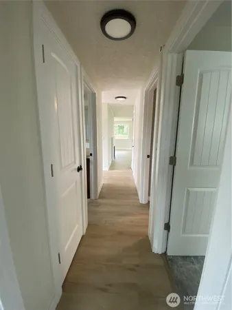 a swimming pool with wooden fence