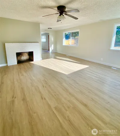 a view of a livingroom with a fireplace
