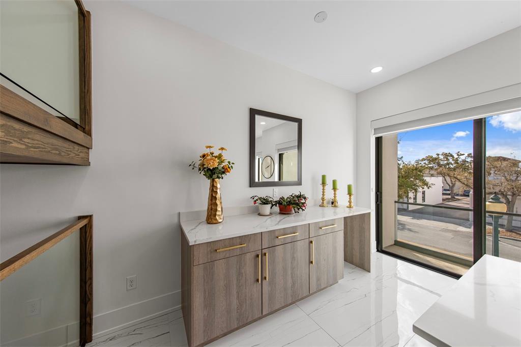 2187 Main Street Sarasota, FL 34237 - Photo 20 of 46 a room with a sink and a mirror