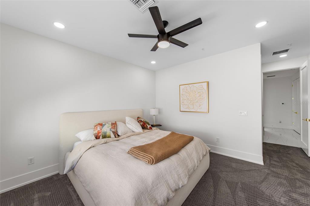 2187 Main Street Sarasota, FL 34237 - Photo 31 of 46 a bedroom with a bed and a window
