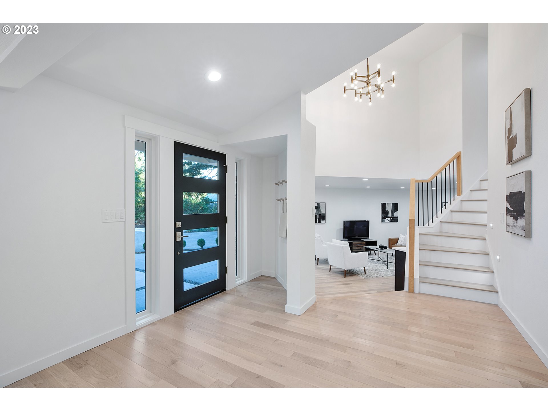 9906 Northwest Leahy Road Portland, OR 97229 - Photo 25 of 36 a view of an entryway and livingroom with furniture
