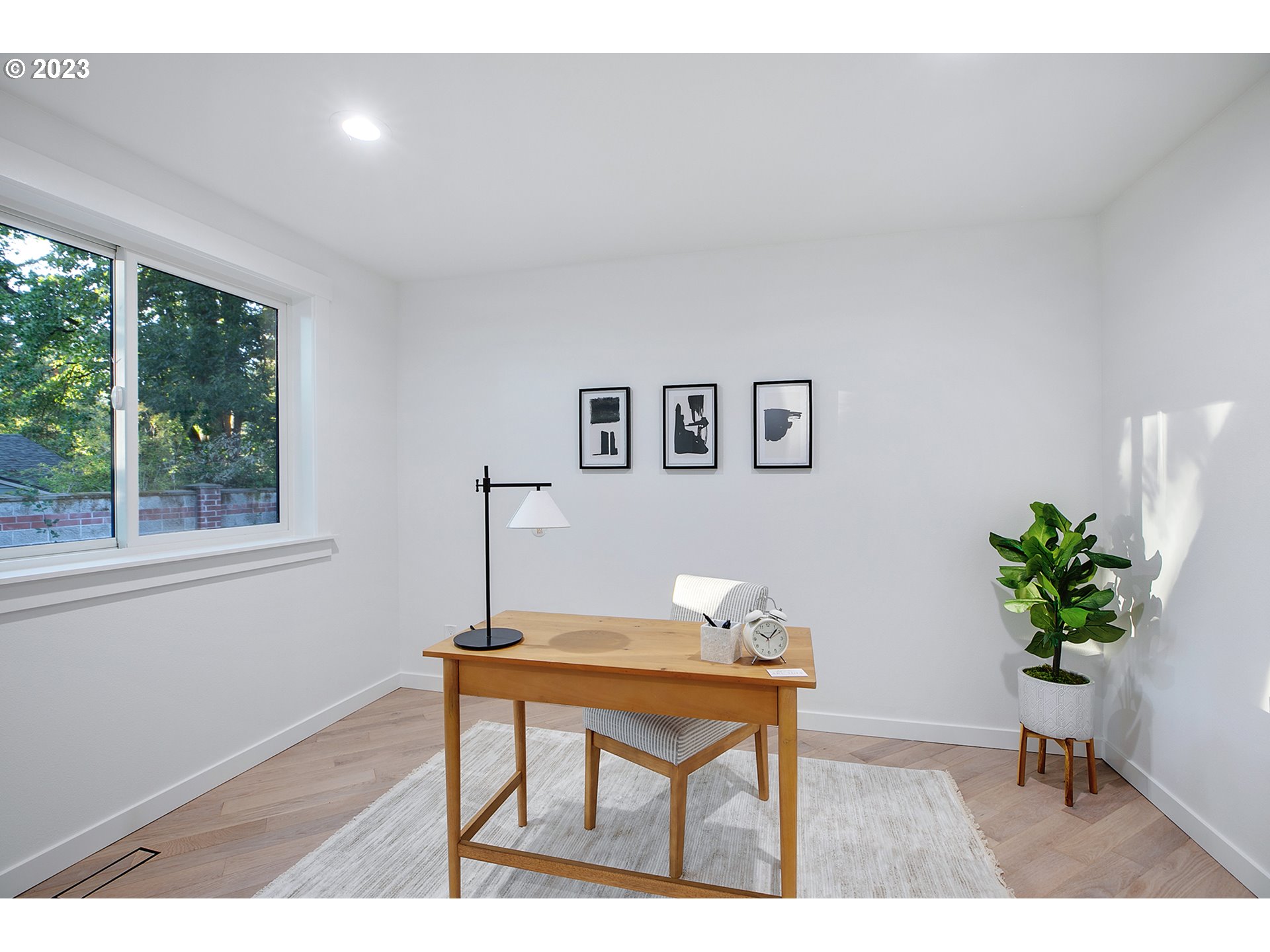 9906 Northwest Leahy Road Portland, OR 97229 - Photo 29 of 36 a workspace with furniture and window