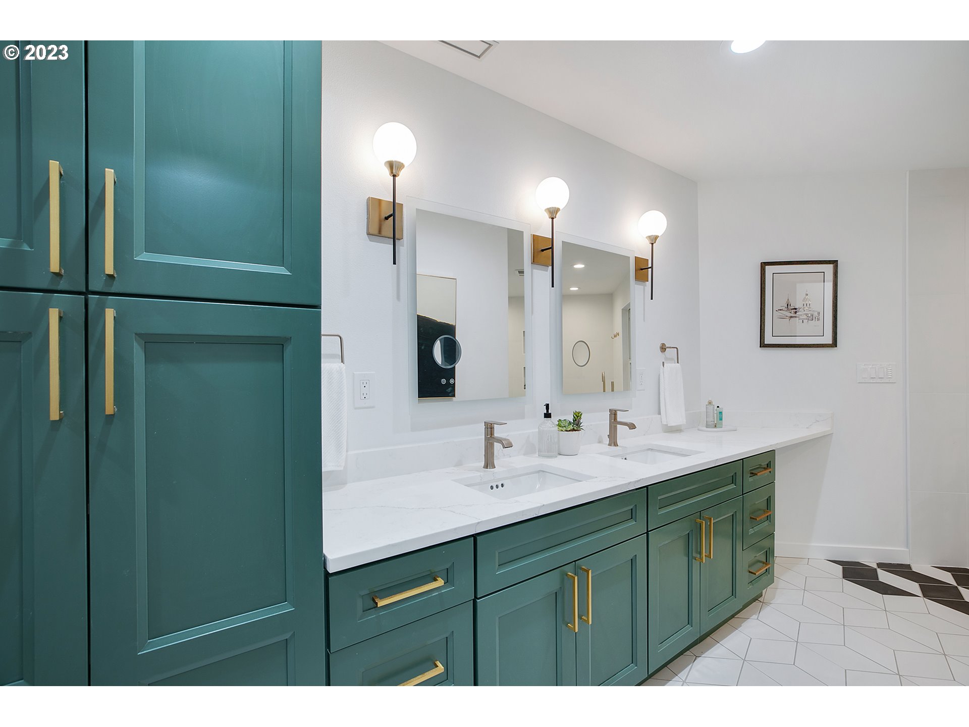 9906 Northwest Leahy Road Portland, OR 97229 - Photo 32 of 36 a bathroom with a double vanity sink and mirror