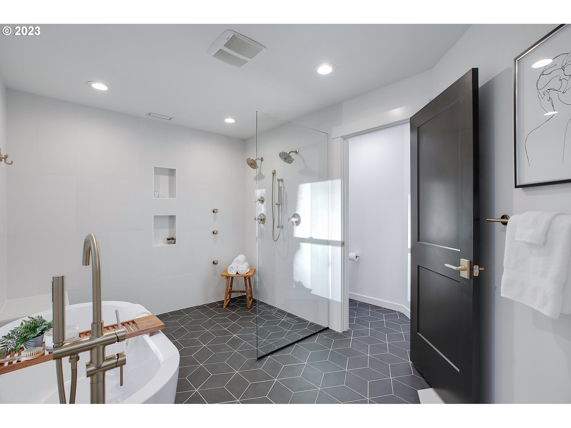 9906 Northwest Leahy Road Portland, OR 97229 - Photo 34 of 36 a bathroom with a sink and a mirror