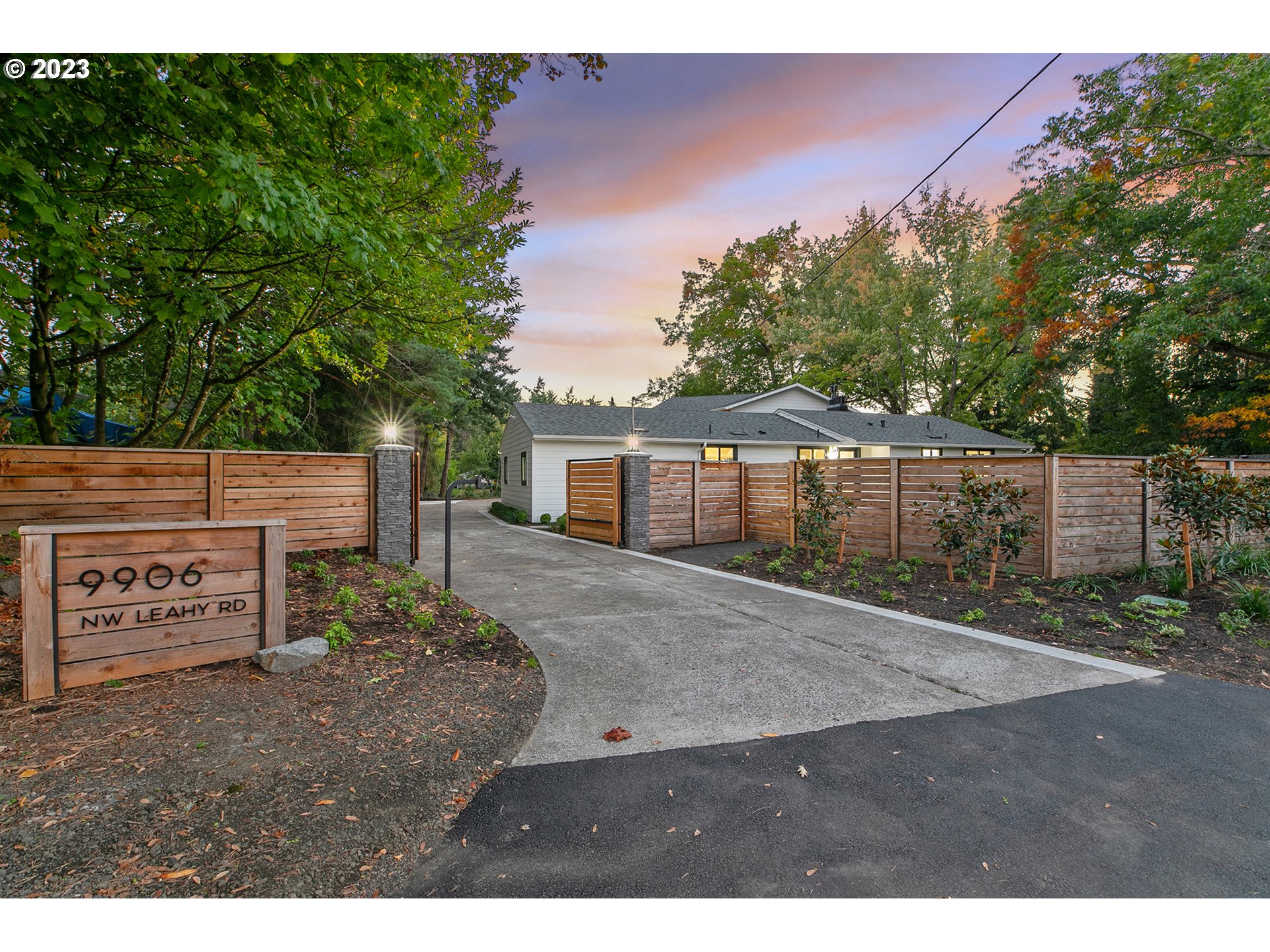 9906 Northwest Leahy Road Portland, OR 97229 - Photo 35 of 36 a view of a house with a yard