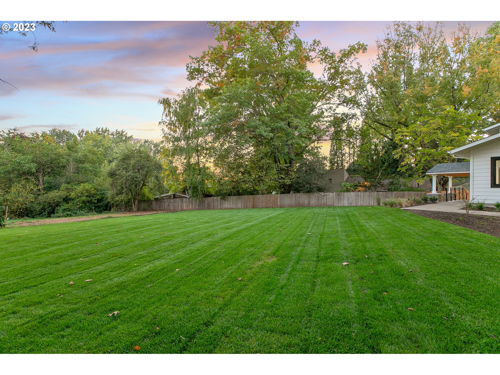 9906 Northwest Leahy Road Portland, OR 97229 - Photo 8 of 36 a view of a backyard with a garden