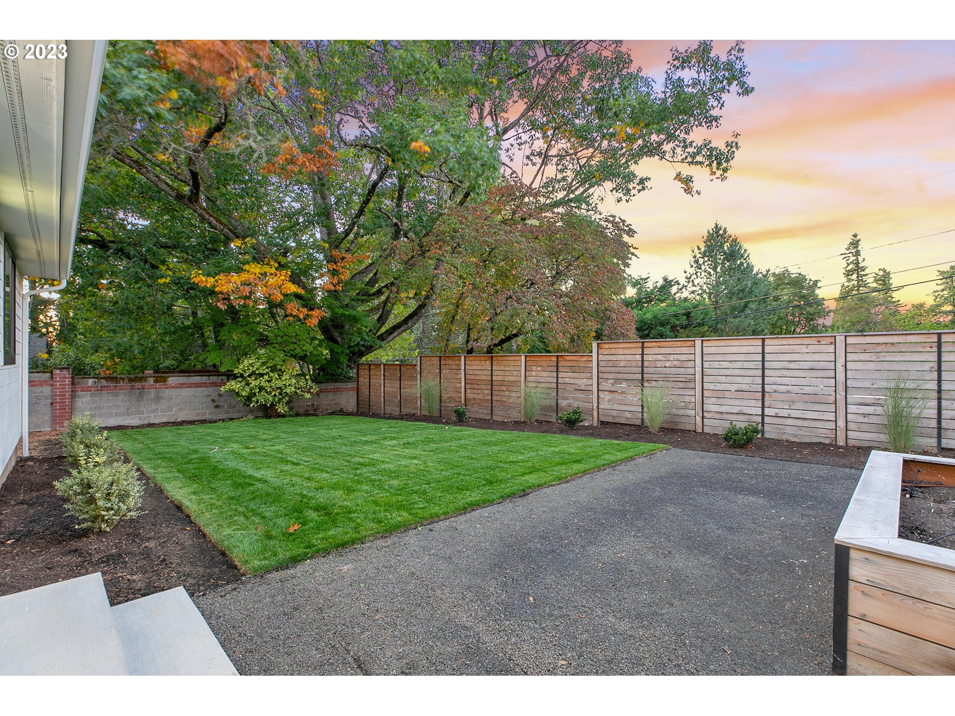 9906 Northwest Leahy Road Portland, OR 97229 - Photo 10 of 36 a view of a backyard with green space