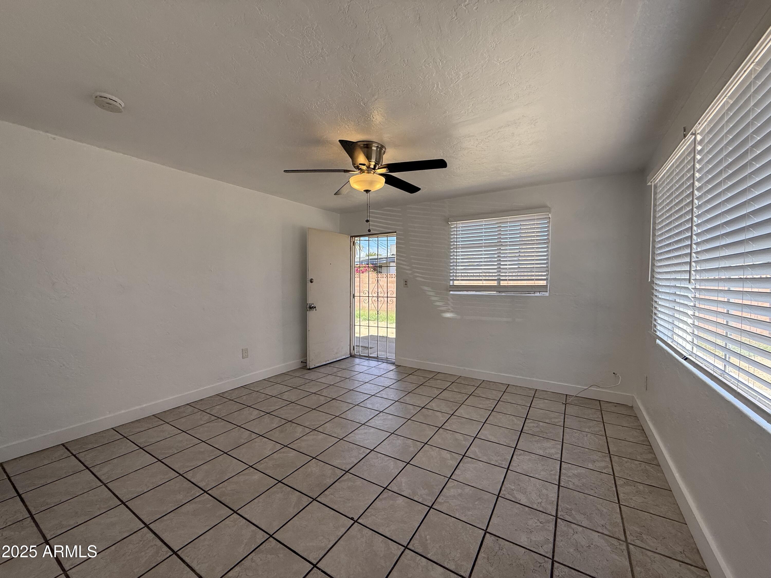 7532 North 21st Avenue, Unit 1 Phoenix, AZ 85021 - Photo 15 of 19 a view of an empty room and window
