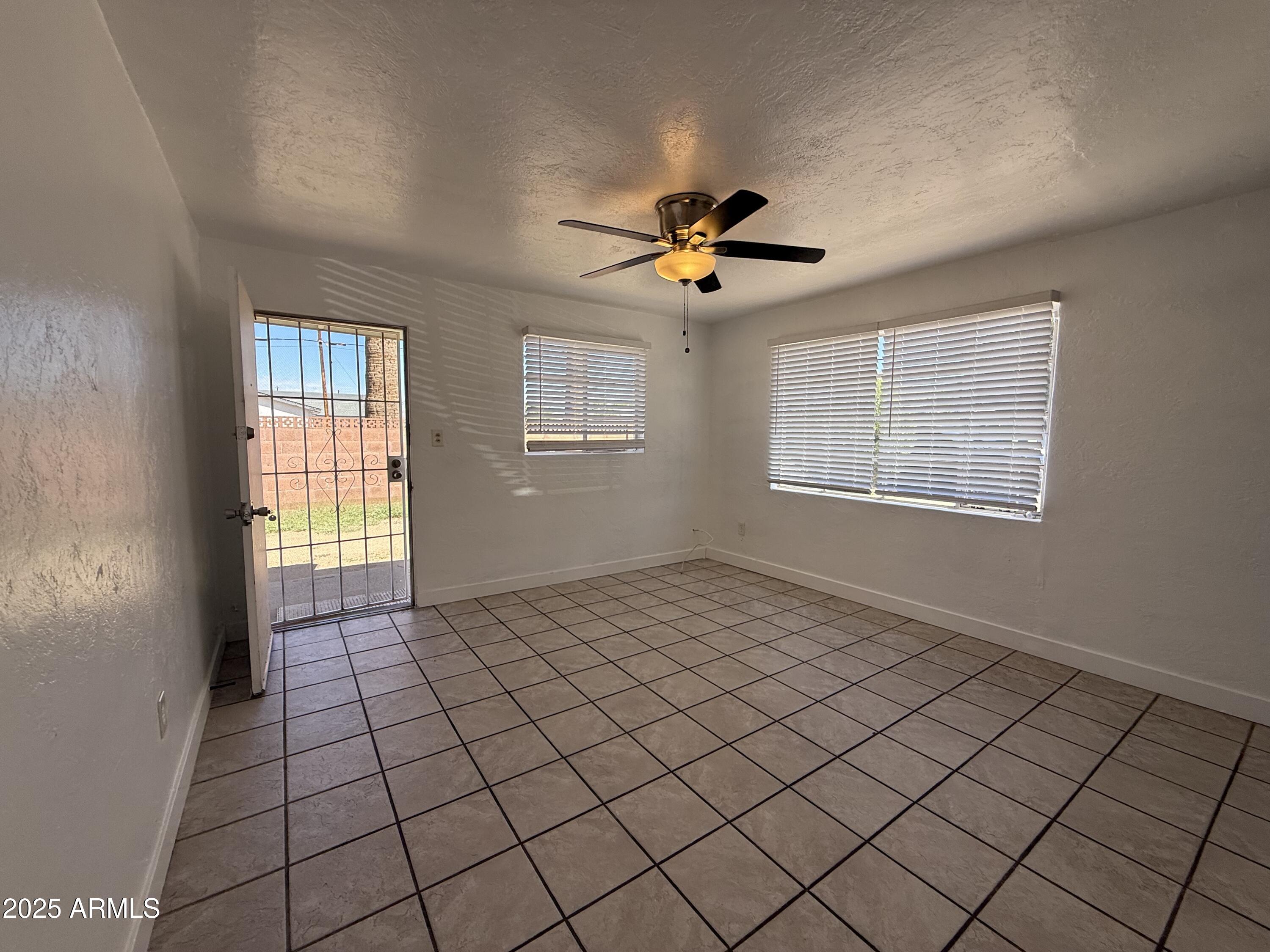 7532 North 21st Avenue, Unit 1 Phoenix, AZ 85021 - Photo 16 of 19 a view of an empty room and window