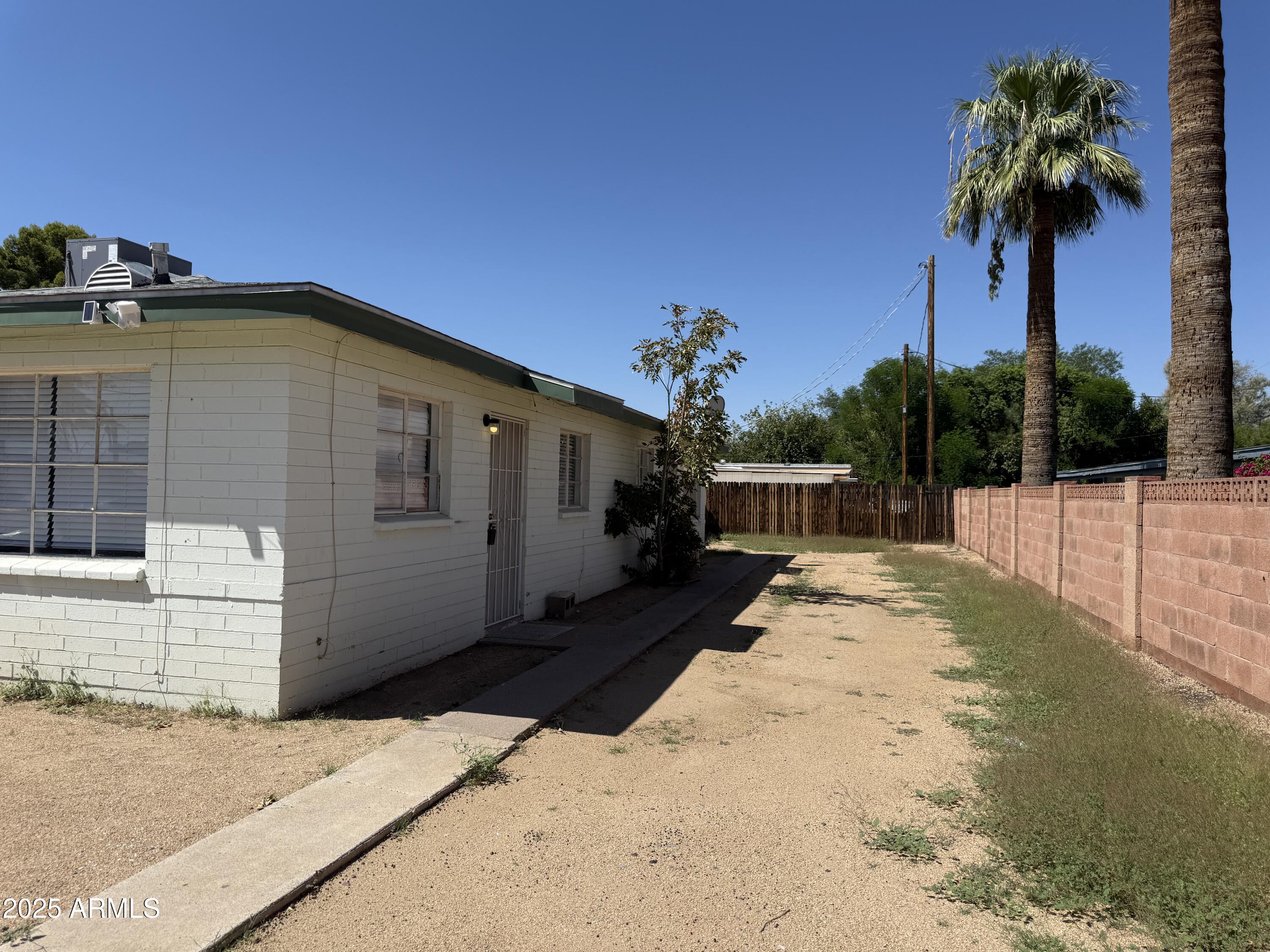 7532 North 21st Avenue, Unit 1 Phoenix, AZ 85021 - Photo 19 of 19 a view of a backyard with a potted plant