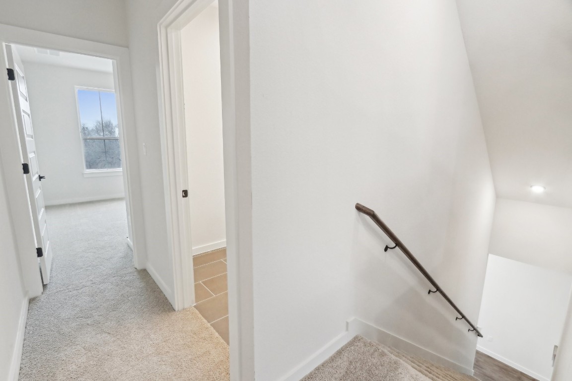 2600 Gattis School Road, Unit 1001 Round Rock, TX 78664 - Photo 29 of 36 a view of a hallway with a white walls