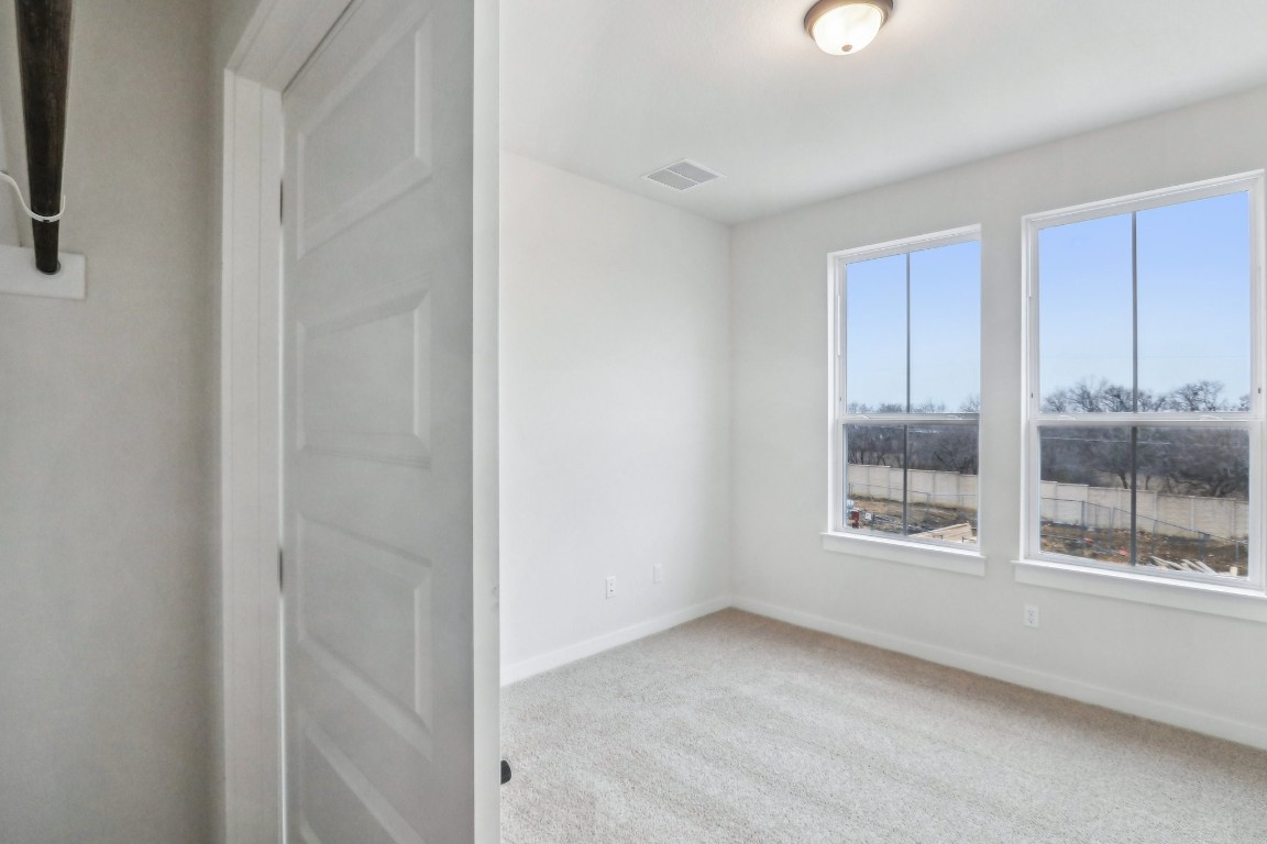 2600 Gattis School Road, Unit 1001 Round Rock, TX 78664 - Photo 33 of 36 a view of an empty room with a window