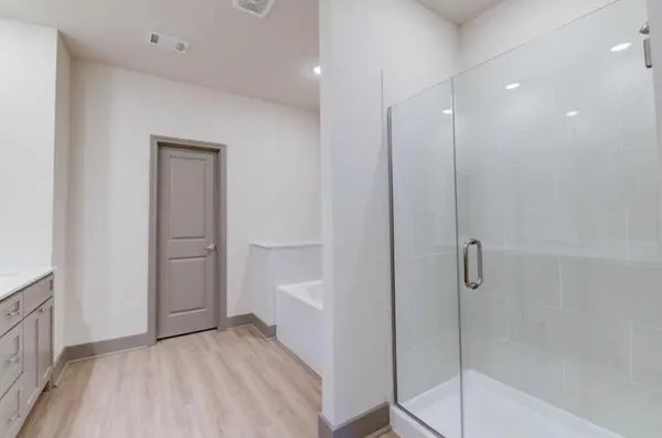 a view of an empty walk in closet