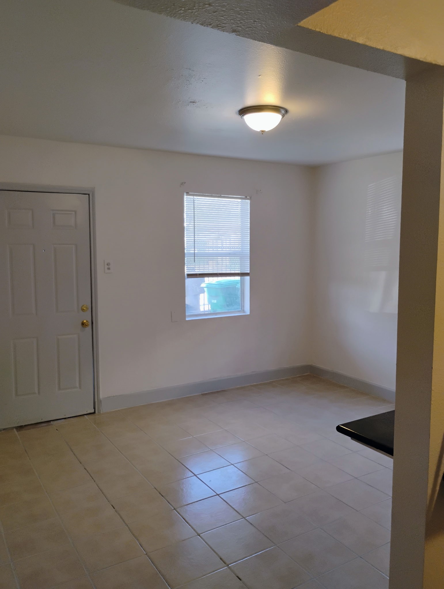 3002 Market Street, Unit 1 Houston, TX 77020 - Photo 4 of 10 an empty room with windows and closet