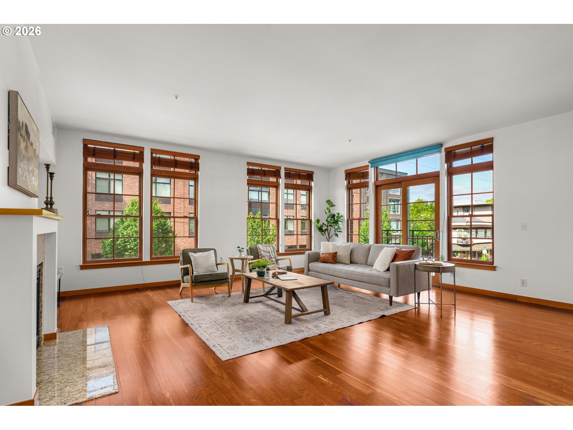 2350 Northwest Savier Street, Unit 224 Portland, OR 97210 - Photo 2 of 19 a living room with furniture and floor to ceiling windows
