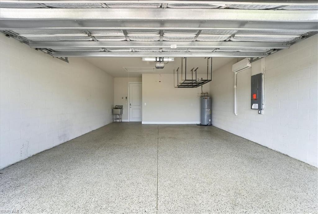 5935 Mayflower Way Ave Maria, FL 34142 - Photo 20 of 36 a view of a room with a hallway