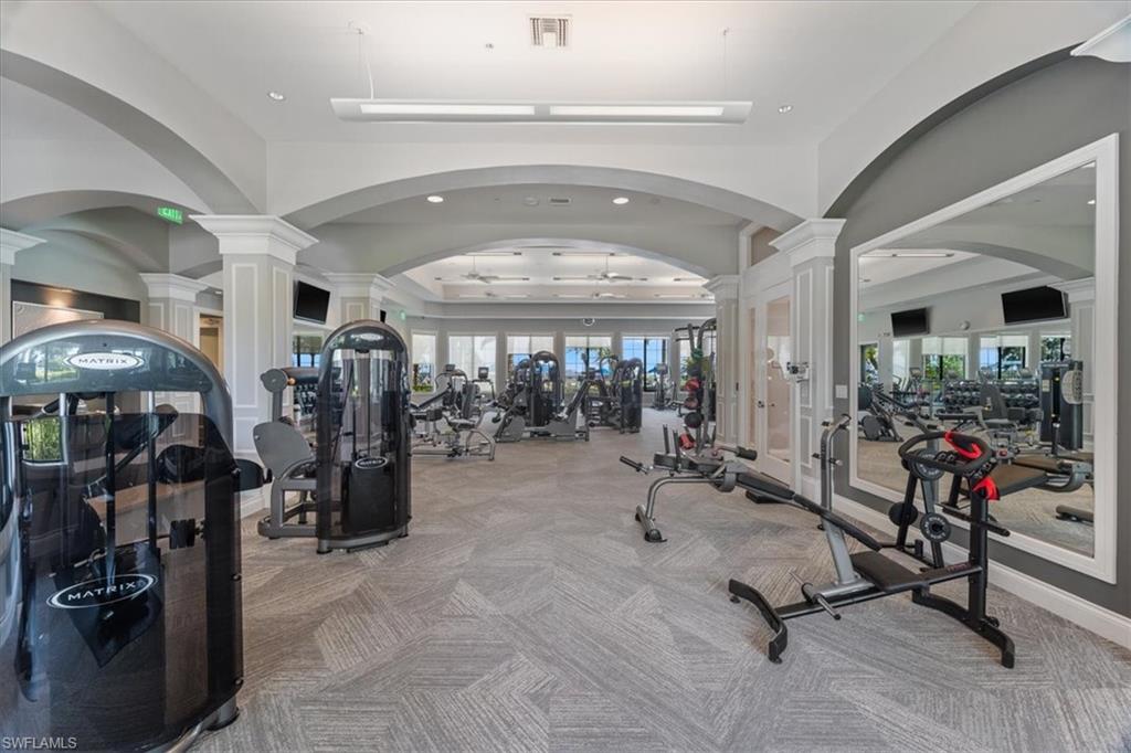 5935 Mayflower Way Ave Maria, FL 34142 - Photo 31 of 36 a view of a room with gym equipment