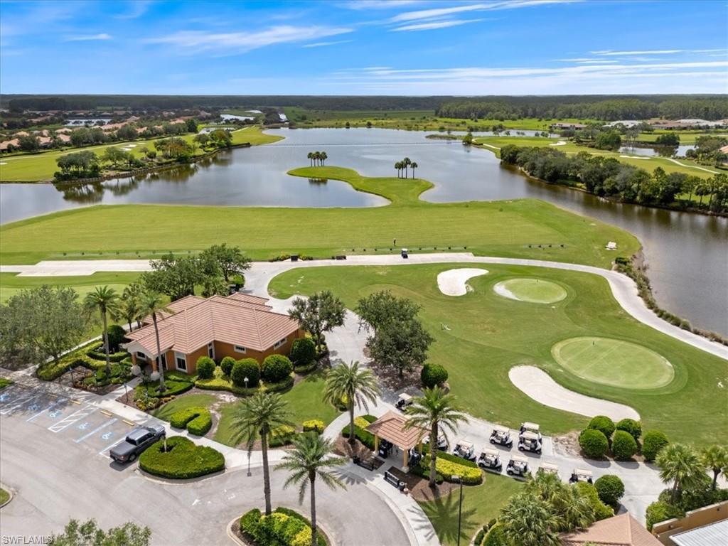 5935 Mayflower Way Ave Maria, FL 34142 - Photo 33 of 36 an aerial view of a residential houses with outdoor space