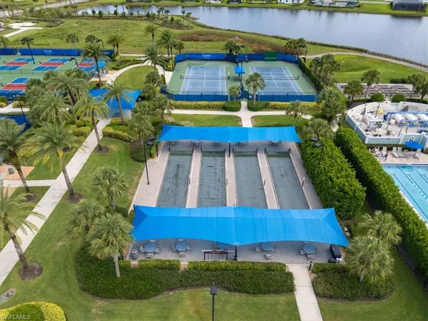 a view of swimming pool with outdoor seating and yard