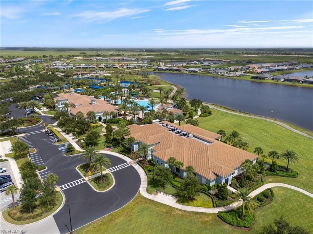 5935 Mayflower Way Ave Maria, FL 34142 - Photo 8 of 18 an aerial view of residential houses with outdoor space