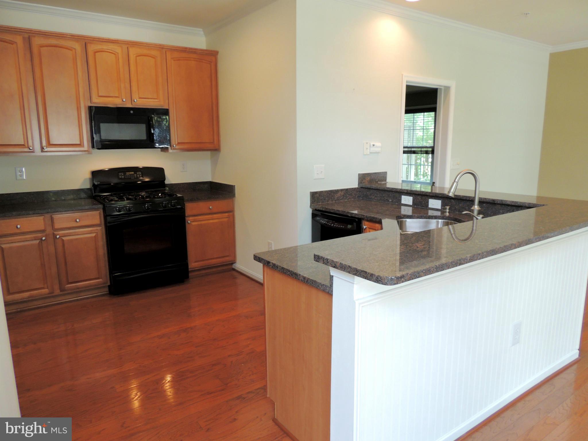 684 Ruxton Road, Unit 66 Dowell, MD 20629 - Photo 12 of 28 Kitchen - Gas Cooking