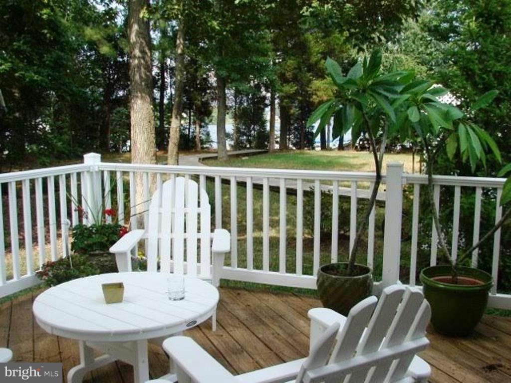 684 Ruxton Road, Unit 66 Dowell, MD 20629 - Photo 3 of 28 Spacious 12x30 Deck Overlooks Water