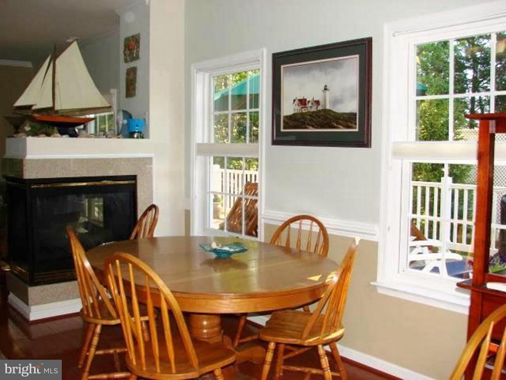 684 Ruxton Road, Unit 66 Dowell, MD 20629 - Photo 5 of 28 Dining Room and Gas Fireplace