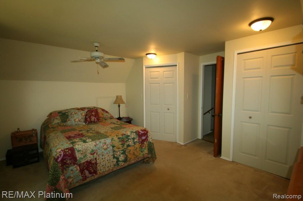 10255 Kress Road Pinckney, MI 48169 - Photo 23 of 30 Master Bedroom w/ Walk-in Closet and Spare Closet
