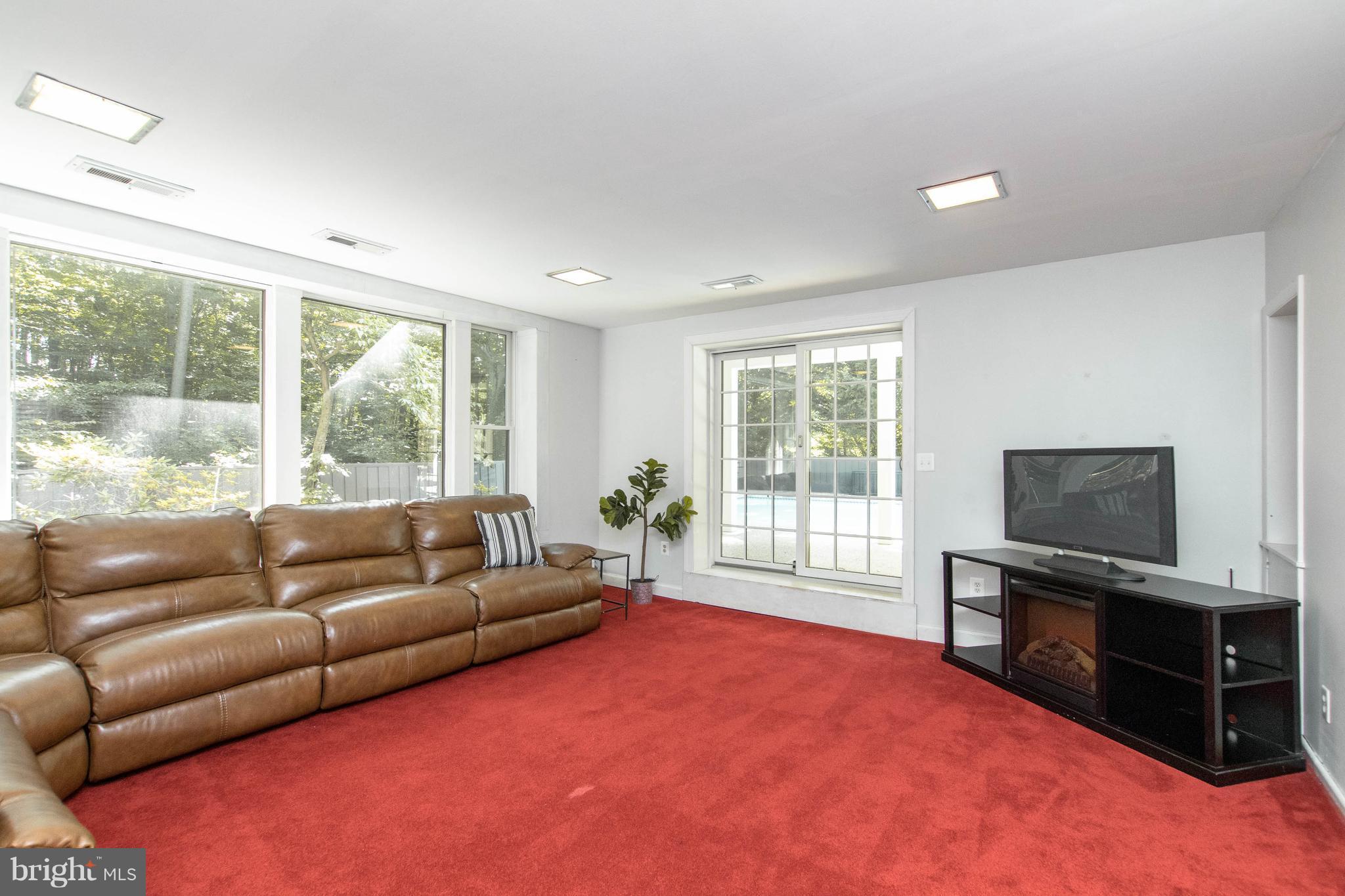10 Burnbrae Road Towson, MD 21204 - Photo 26 of 30 Second Family Room in lower level- access to pool
