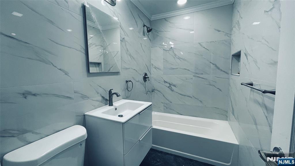 86 North Walnut Street Ridgewood, NJ 07450 - Photo 16 of 17 a bathroom with a sink a toilet and shower