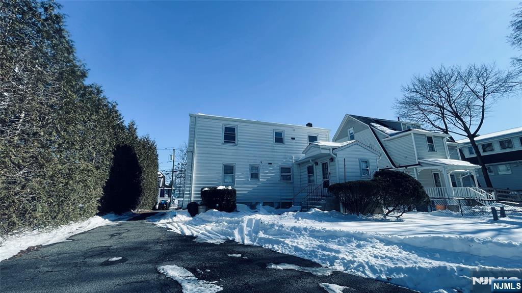86 North Walnut Street Ridgewood, NJ 07450 - Photo 3 of 17 a view of a street with cars parked