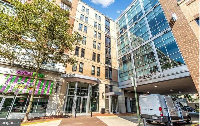 a view of a building with a street