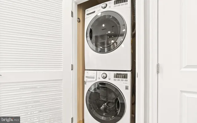 a view of washer and dryer in a utility room