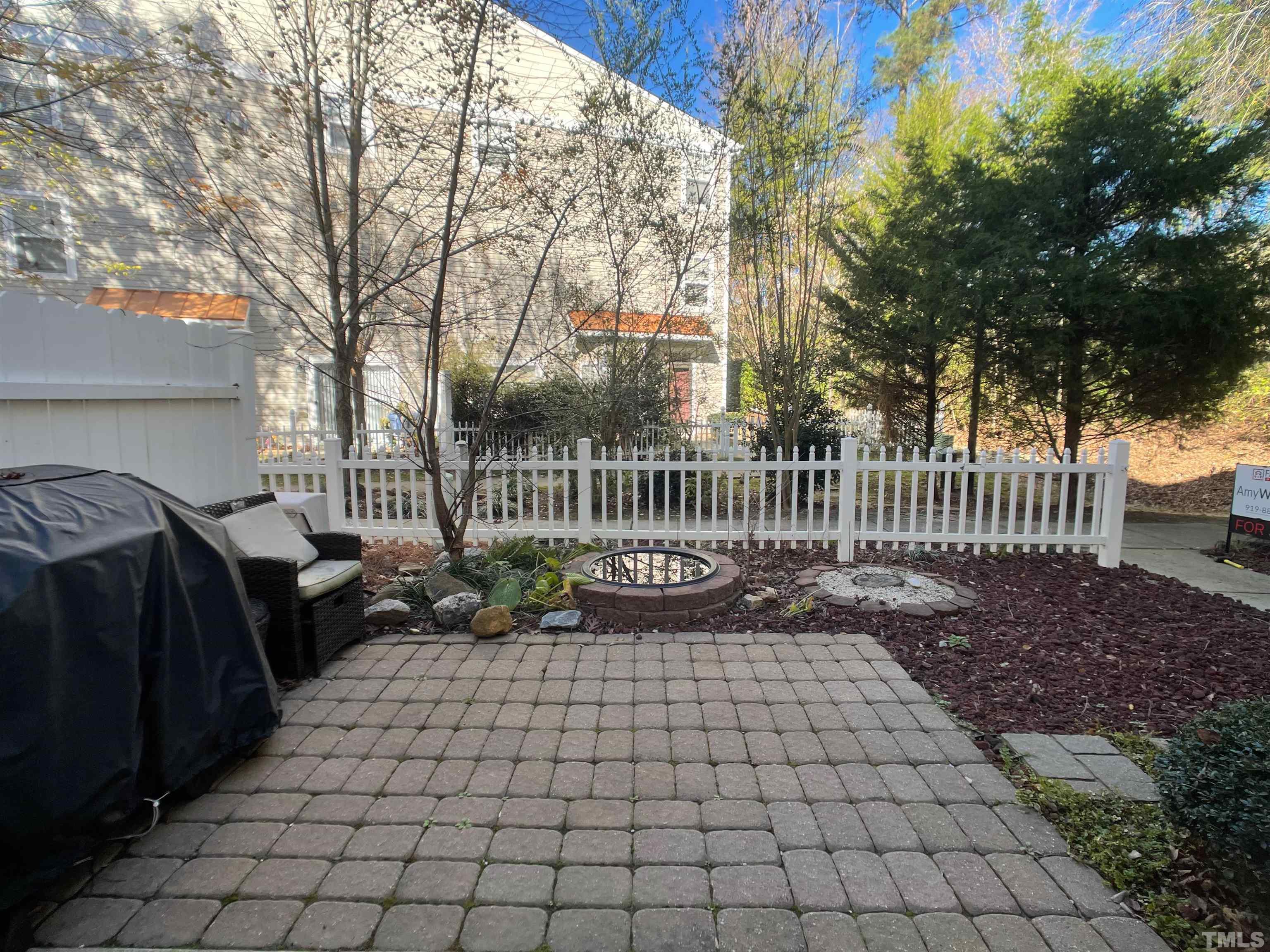 11710 Mezzanine Drive, Unit 101 Raleigh, NC 27614 - Photo 11 of 23 a view of a porch with a bench