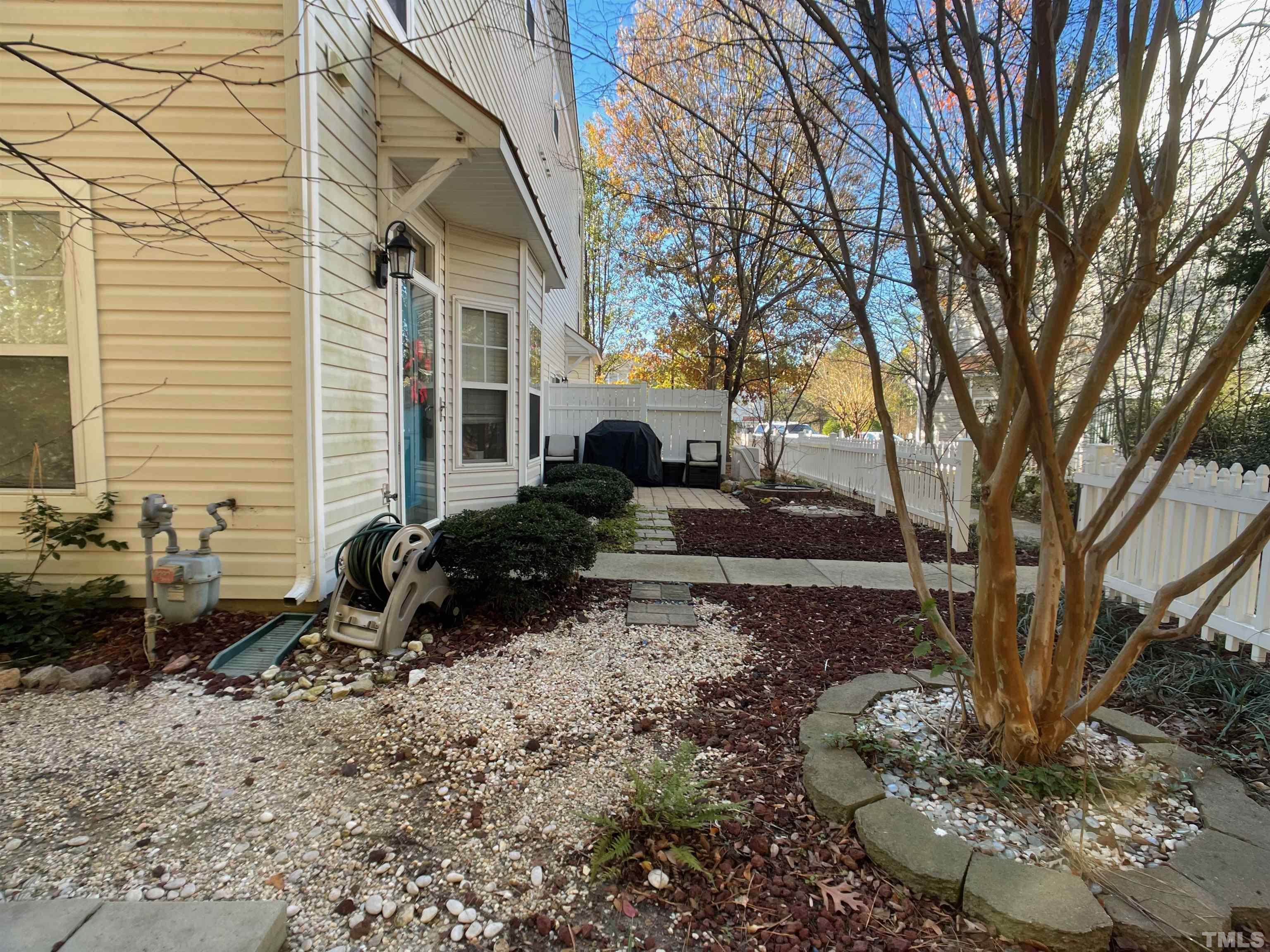 11710 Mezzanine Drive, Unit 101 Raleigh, NC 27614 - Photo 20 of 23 a view of a house with backyard