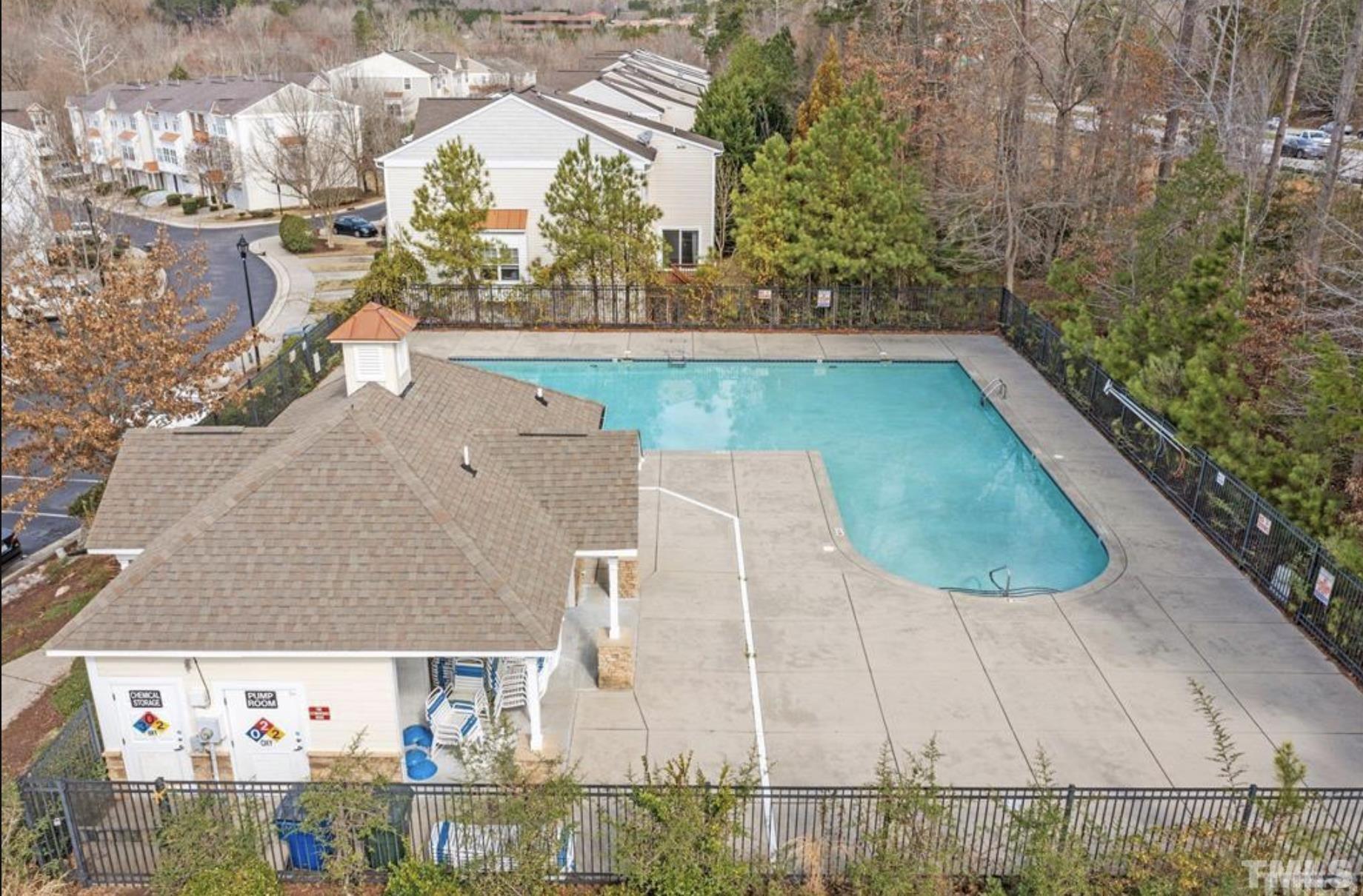 11710 Mezzanine Drive, Unit 101 Raleigh, NC 27614 - Photo 23 of 23 an aerial view of residential houses with outdoor space and swimming pool