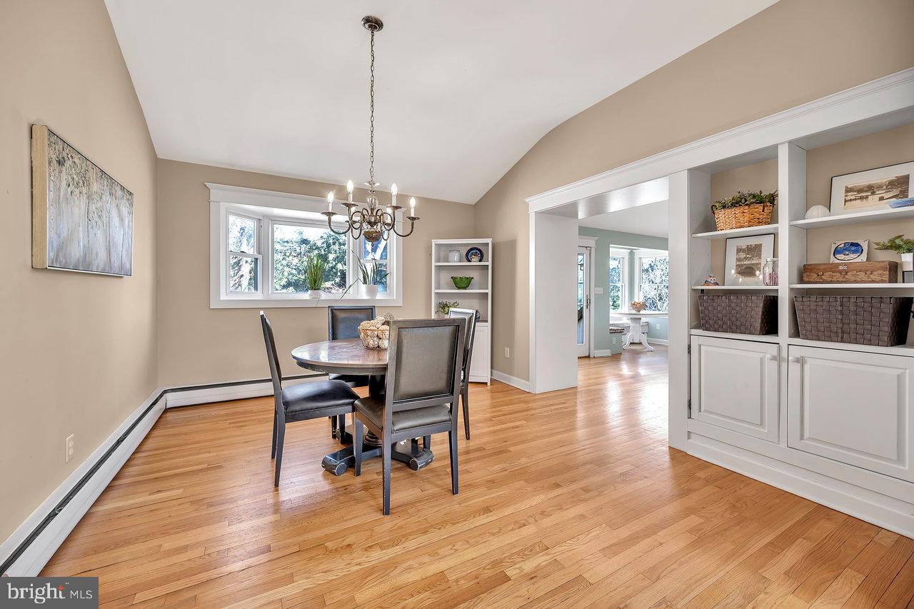 23 Griggs Road Cranbury, NJ 08512 - Photo 13 of 40 a view of a dining room with furniture window and wooden floor