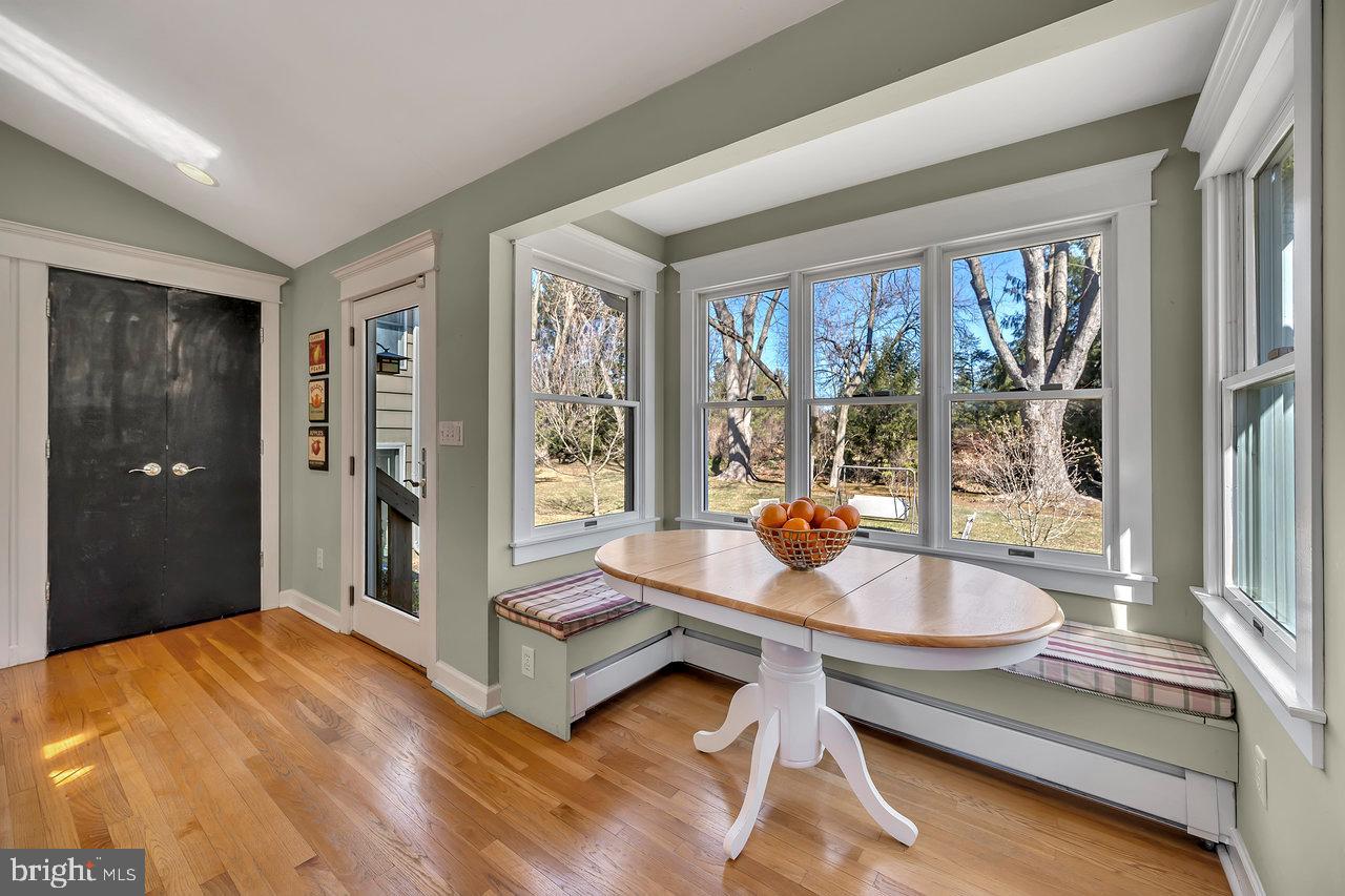 23 Griggs Road Cranbury, NJ 08512 - Photo 21 of 40 a room with patio furniture and a wooden floor