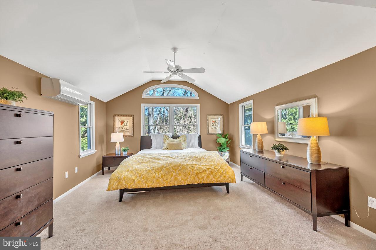 23 Griggs Road Cranbury, NJ 08512 - Photo 22 of 40 a spacious bedroom with a bed and a dresser