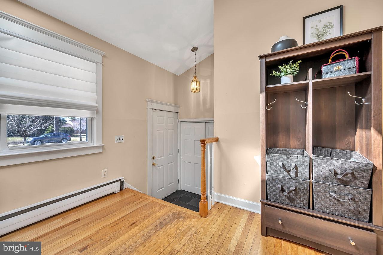 23 Griggs Road Cranbury, NJ 08512 - Photo 7 of 40 a view of empty room with wooden floor