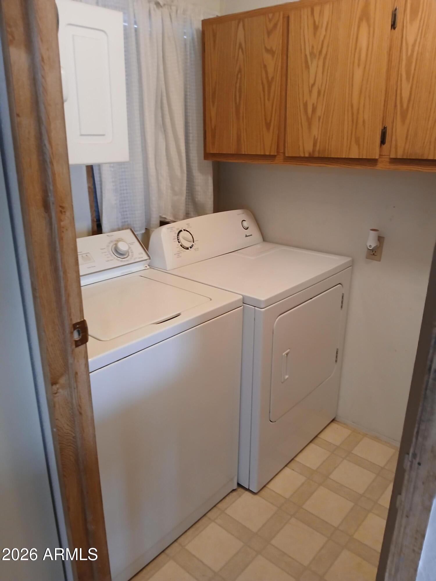 834 South Meridian Road, Unit 162 Apache Junction, AZ 85120 - Photo 6 of 32 a utility room with dryer and washer