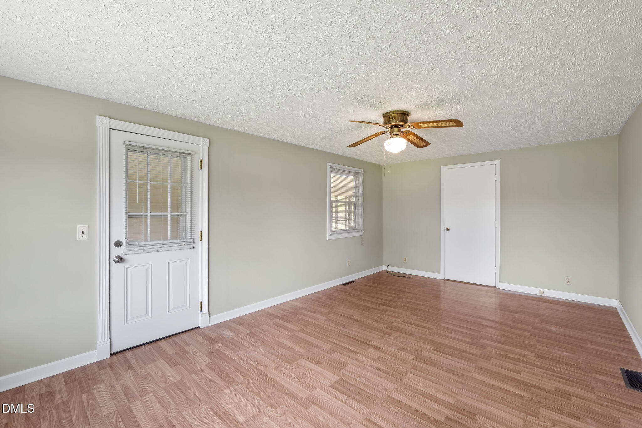 95 Harold Gill Road Roxboro, NC 27574 - Photo 13 of 53 a view of an empty room with a window
