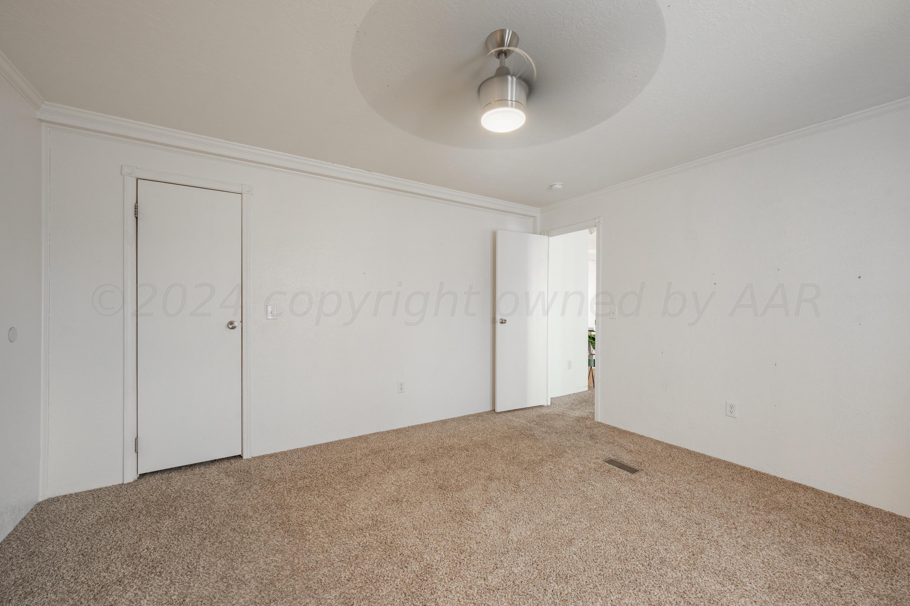 8701 Foxtail Street Amarillo, TX 79118 - Photo 21 of 33 a view of an empty room